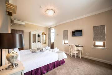 Фото номера Апартаменты с 2 спальнями Отель The Frontier Hotel г. Siret 5